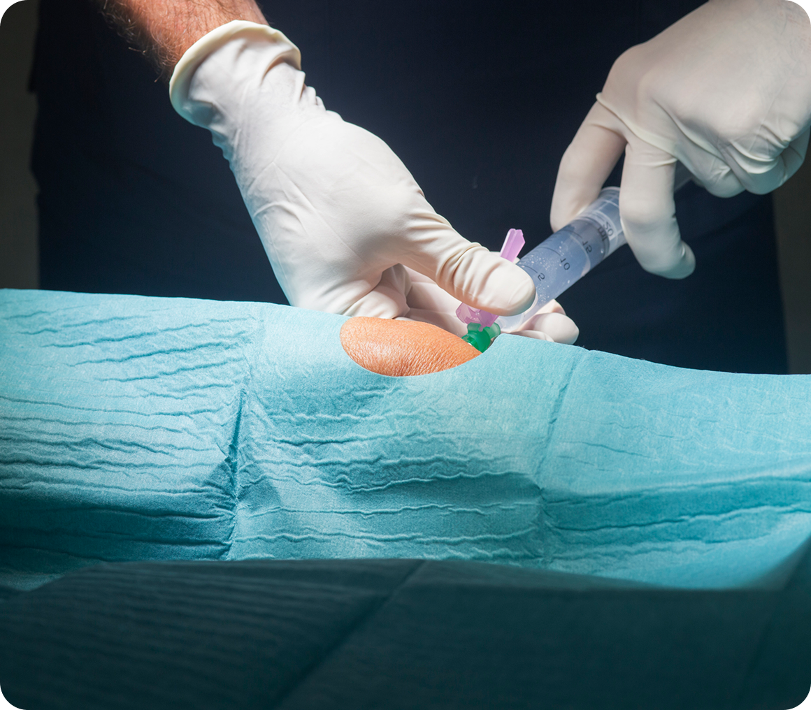 Doctor administering injection