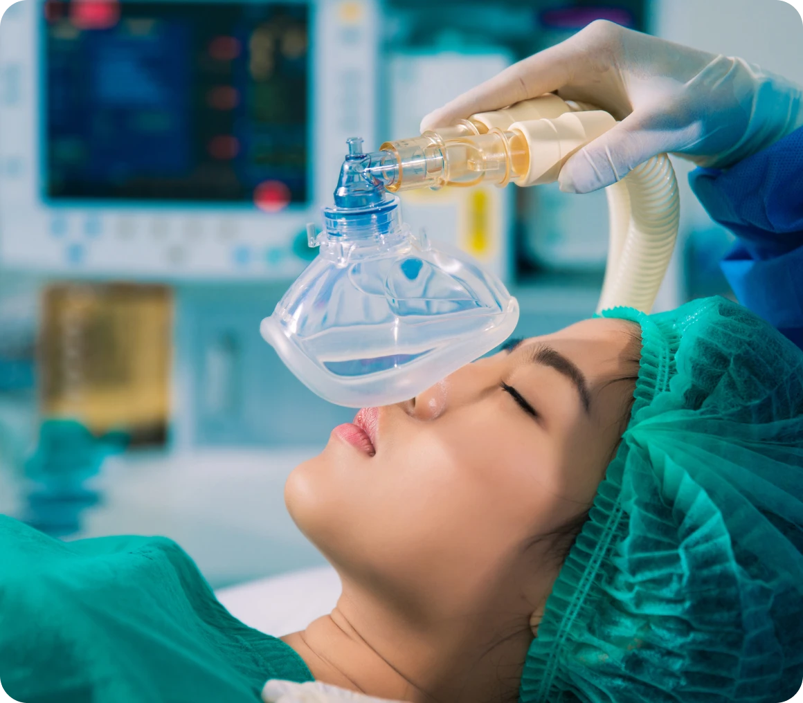 Surgical patient under anesthesia with mask